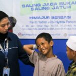Anak-anak Panti Antusias Ikuti Love in Touch Bersama HIMAJUR IISIP Jakarta